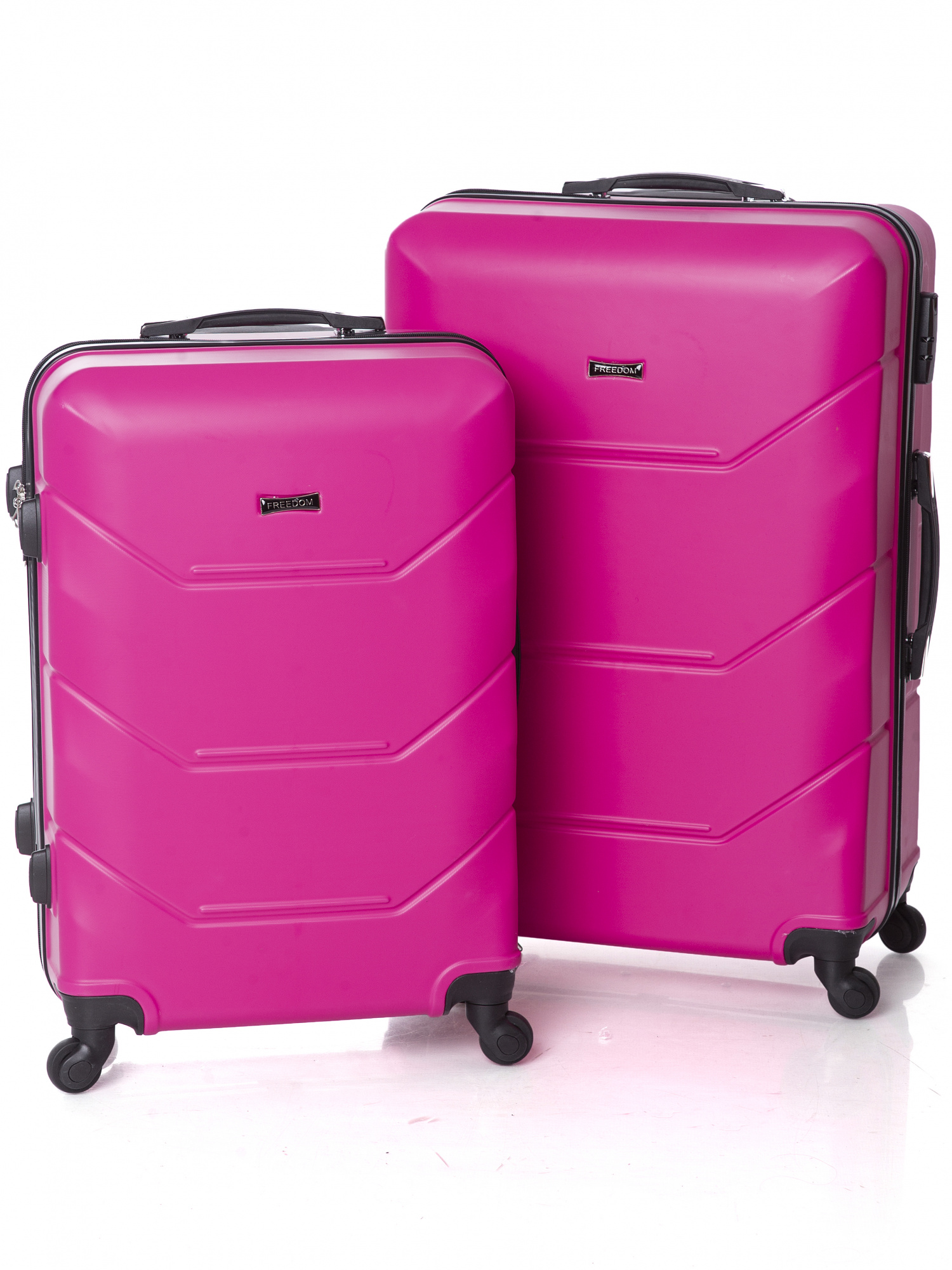  Комплект из 2-х чемоданов Freedom 2в1. Цвет Фуксия. Размер M+S (ручная кладь)